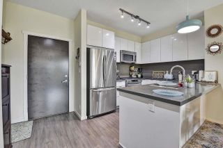 Photo 3: 102 1135 WINDSOR Mews in Coquitlam: New Horizons Condo for sale : MLS®# R2714199