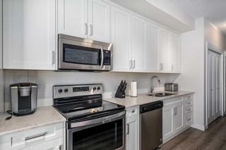 Photo 3: 405 200 Auburn Meadows Common SE in Calgary: Auburn Bay Apartment for sale : MLS®# A2131075