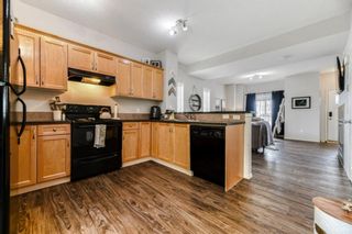 Photo 14: 611 Strathaven Mews: Strathmore Row/Townhouse for sale : MLS®# A1222709