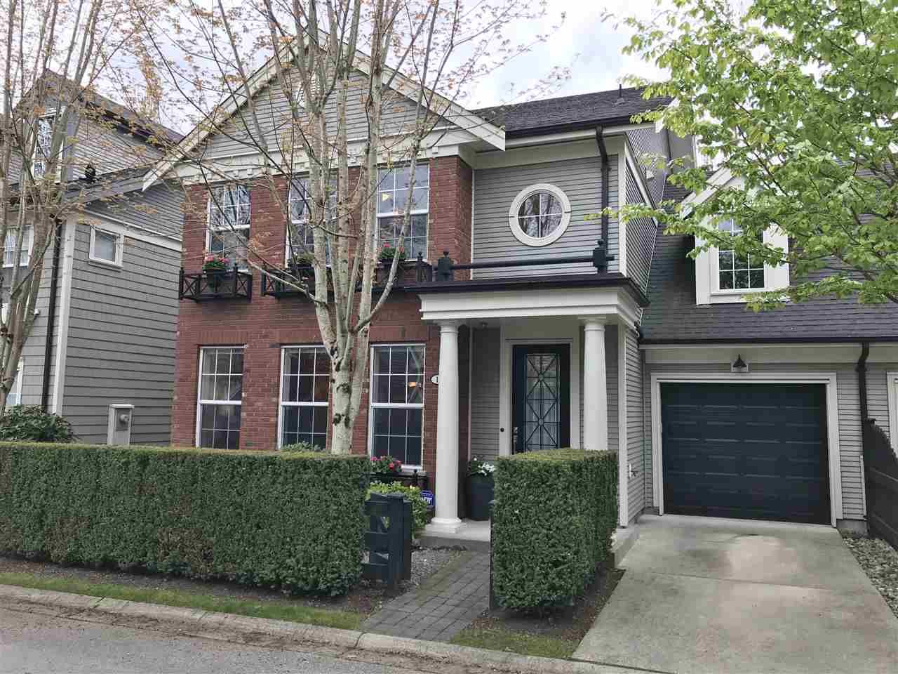 Main Photo: 18 19490 FRASER Way in Pitt Meadows: South Meadows Townhouse for sale in "Kingfisher at Osprey" : MLS®# R2444045