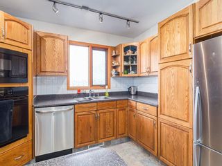 Photo 11: 2611 CANMORE RD NW in Calgary: Banff Trail House for sale : MLS®# C4146643