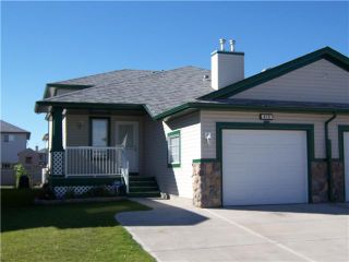 Photo 1: 415 STONEGATE Rise NW: Airdrie Residential Attached for sale : MLS®# C3442625