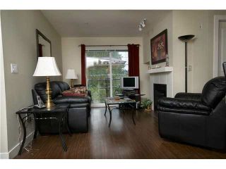 Photo 2: 404 3260 ST JOHNS Street in Port Moody: Port Moody Centre Condo for sale in "THE SQUARE" : MLS®# V1086742
