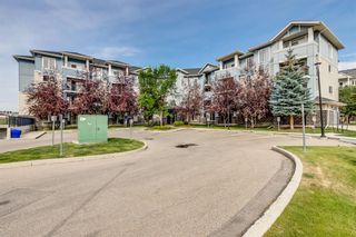 Photo 1: 102 108 Country Village Circle NE in Calgary: Country Hills Village Apartment for sale : MLS®# A1251151