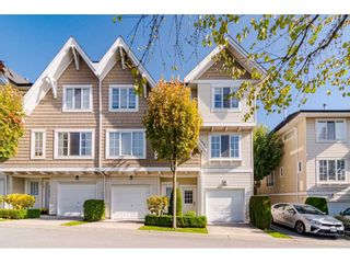 Photo 1: 28 20560 66 Avenue in Langley: Willoughby Heights Townhouse for sale in "Amberleigh 2" : MLS®# R2506602