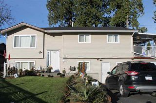 Photo 1: 9582 132A ST in Surrey: Queen Mary Park Surrey House for sale : MLS®# R2017643