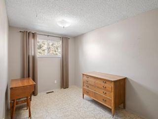 Photo 13: 408 60 Avenue NE in Calgary: Thorncliffe Semi Detached for sale : MLS®# A1190074