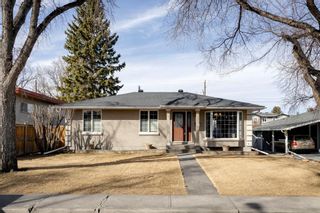 Photo 1: 2040 56 Avenue SW in Calgary: North Glenmore Park Detached for sale : MLS®# A1201864