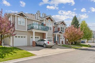Photo 1: 501 39 Hidden Creek Place NW in Calgary: Hidden Valley Row/Townhouse for sale : MLS®# A2137898