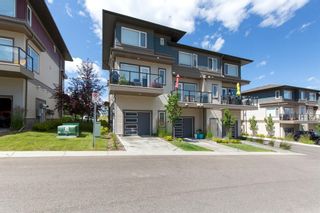 Photo 3: 201 501 River Heights Drive: Cochrane Row/Townhouse for sale : MLS®# A1250960