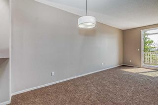 Photo 5: 2004 125 Panatella Way NW in Calgary: Panorama Hills Row/Townhouse for sale : MLS®# A2056398