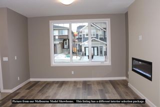 Photo 6: 398 Sundown Road: Cochrane Semi Detached (Half Duplex) for sale : MLS®# A2009367