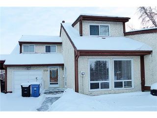 Photo 1: 1124 CANTERBURY Drive SW in Calgary: Canyon Meadows House for sale : MLS®# C4092925