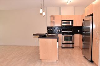 Photo 10: 105 69 SPRINGBOROUGH Court SW in Calgary: Springbank Hill Apartment for sale : MLS®# C4305544