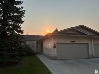 Photo 1: 213 KNOTTWOOD Road N in Edmonton: Zone 29 House Half Duplex for sale : MLS®# E4358848