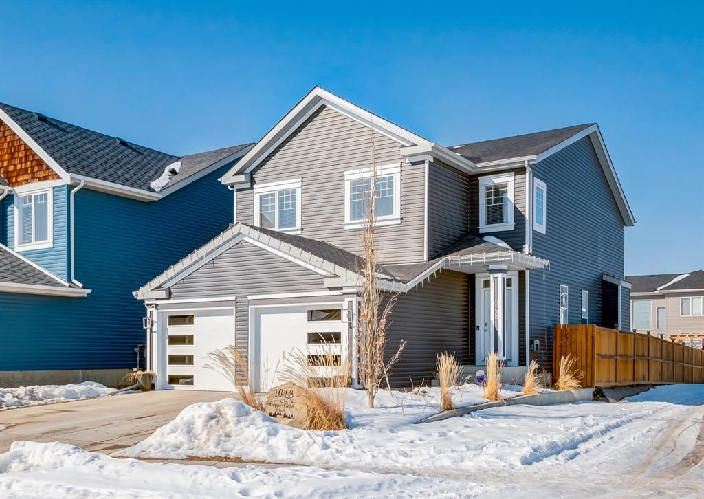 Main Photo: 1048 Copperfield Boulevard SE in Calgary: Copperfield Detached for sale : MLS®# A2033001