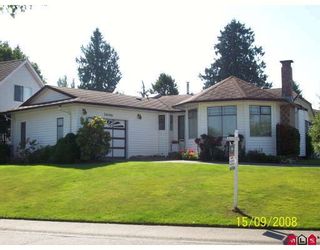 Photo 1: 20106 50A Avenue in Langley: Langley City House for sale : MLS®# F2826817