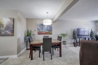 Photo 11: 555 Panatella Boulevard NW in Calgary: Panorama Hills Row/Townhouse for sale : MLS®# A2034434