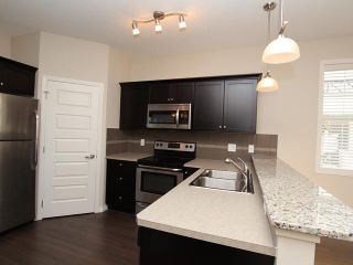 Photo 5: 4105 1001 EIGHTH Street NW: Airdrie Townhouse for sale : MLS®# C3639414