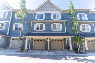 Photo 1: 2109 125 Panatella Way NW in Calgary: Panorama Hills Row/Townhouse for sale : MLS®# A2130080