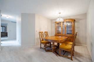 Photo 18: 74 Woodmeadow Close SW in Calgary: Woodlands Row/Townhouse for sale : MLS®# A2044732