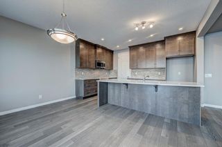 Photo 11: 102 Yorkstone Way SW in Calgary: Yorkville Detached for sale : MLS®# A1055580