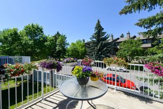 Photo 3: 54 Gladstone Gardens SW in Calgary: Glamorgan Row/Townhouse for sale : MLS®# A1241387
