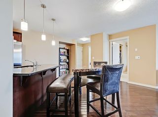 Photo 10: 2212 130 Panatella Street NW in Calgary: Panorama Hills Apartment for sale : MLS®# A1216369