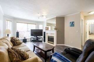 Photo 1: 214 7151 121 Street in Surrey: West Newton Condo for sale in "The Highlands" : MLS®# R2873921