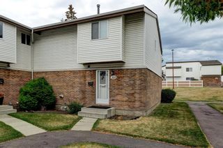 Photo 1: 113 5103 35 Avenue SW in Calgary: Glenbrook Row/Townhouse for sale : MLS®# A2033196