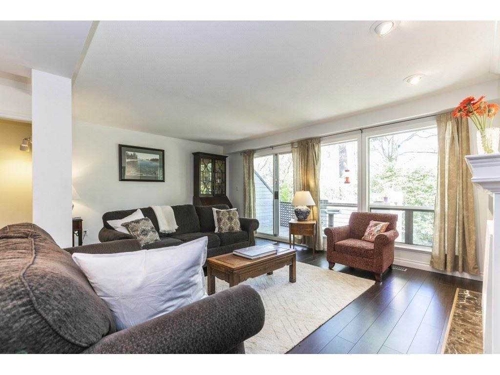 Main Photo: 8224 FOREST GROVE Drive in Burnaby: Forest Hills BN Townhouse for sale in "Henley Estate" (Burnaby North)  : MLS®# R2568811