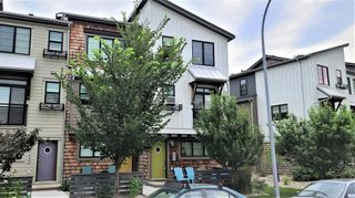 Photo 1: 373 Walden Drive SE in Calgary: Walden Row/Townhouse for sale : MLS®# A1257318