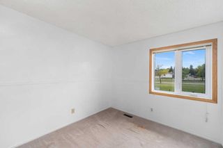 Photo 11: 96 Sandarac Way NW in Calgary: Sandstone Valley Semi Detached (Half Duplex) for sale : MLS®# A2080501