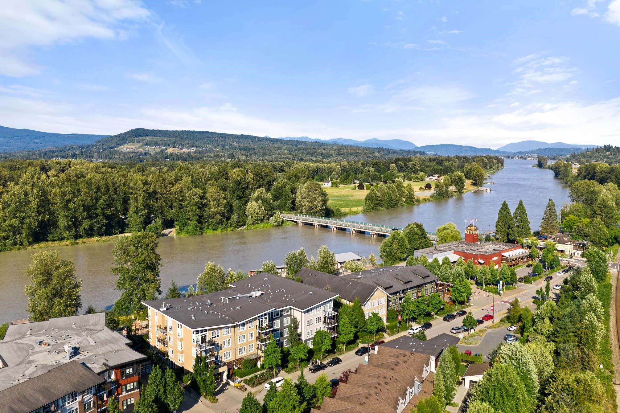 Main Photo: 401 23255 BILLY BROWN Road in Langley: Fort Langley Condo for sale in "Waterfront at Bedford Landing" : MLS®# R2706918