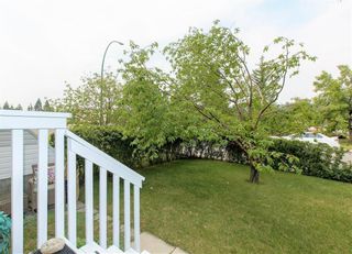 Photo 3: 2 6408 BOWWOOD Drive NW in Calgary: Bowness Row/Townhouse for sale : MLS®# C4241912