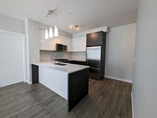 Photo 3: 1305 95 Burma Star Road SW in Calgary: Currie Barracks Apartment for sale : MLS®# A2049637