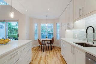 Photo 2: 34 650 ROCHE POINT Drive in North Vancouver: Roche Point Townhouse for sale in "Raven Woods" : MLS®# R2874566