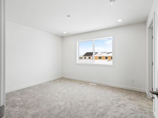 Photo 19: 64 Belvedere Park SE in Calgary: Belvedere Detached for sale : MLS®# A2039265