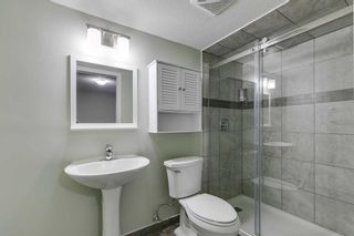 Photo 18: 217 Sunset Point: Cochrane Row/Townhouse for sale : MLS®# A2120759