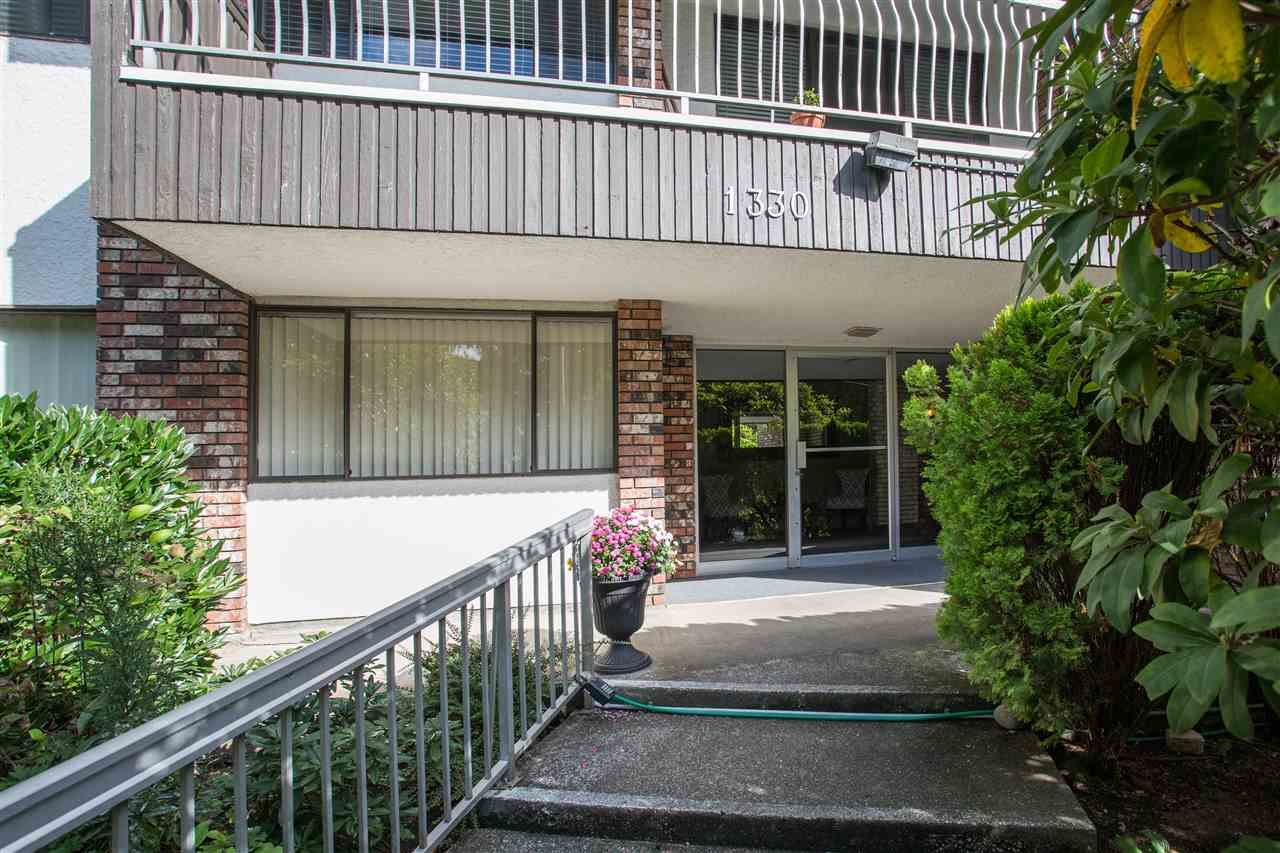 Main Photo: 103 1330 MARTIN Street: White Rock Condo for sale in "THE COACH HOUSE" (South Surrey White Rock)  : MLS®# R2517158