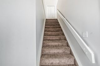 Photo 3: 605 1997 Sirocco Drive SW in Calgary: Signal Hill Row/Townhouse for sale : MLS®# A2042401