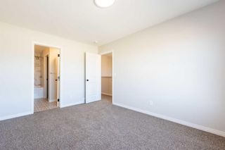 Photo 21: 26 WOLF CREEK Rise SE in Calgary: C-281 Detached for sale : MLS®# A2079870
