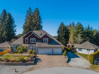 Main Photo: 5327 - 5329 STAMFORD Place in Sechelt: Sechelt District House for sale (Sunshine Coast)  : MLS®# R2702238