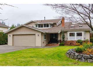 Photo 1: 21021 43 Avenue in Langley: Brookswood Langley House for sale in "Cedar Ridge" : MLS®# R2521660