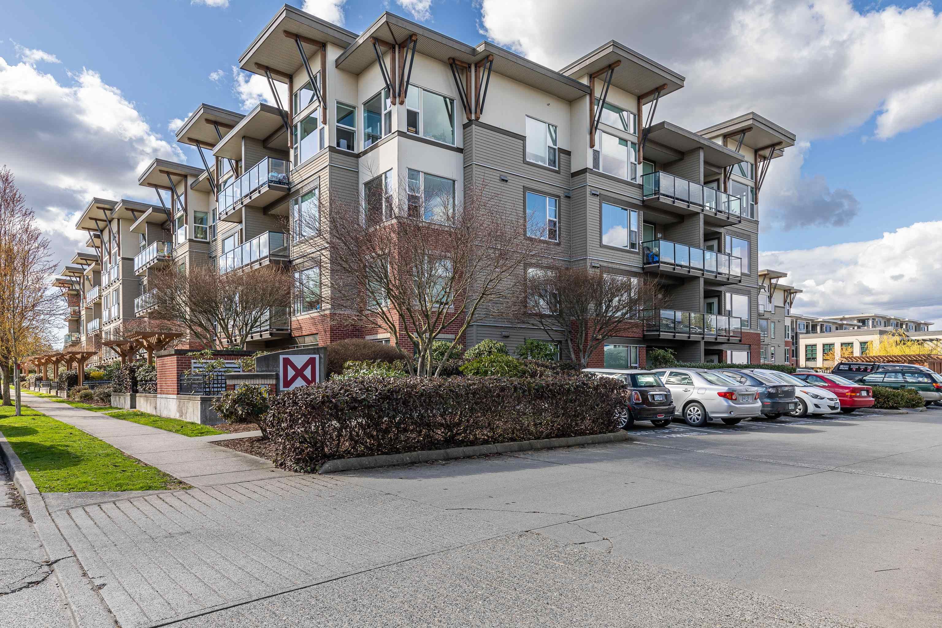 Main Photo: 419 33539 HOLLAND Avenue in Abbotsford: Central Abbotsford Condo for sale in "THE CROSSING" : MLS®# R2690023