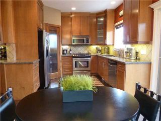 Photo 8: 324 31 Avenue NE in CALGARY: Tuxedo Residential Attached for sale (Calgary)  : MLS®# C3500030