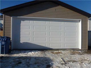 Photo 4: 1303 NEW BRIGHTON Drive SE in Calgary: New Brighton Residential Detached Single Family for sale : MLS®# C3645274
