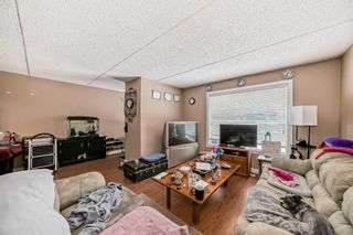 Photo 7: 405 2200 Woodview Drive SW in Calgary: Woodlands Row/Townhouse for sale : MLS®# A2131253