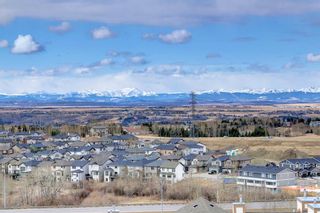 Photo 25: 14 140 Rockyledge View NW in Calgary: Rocky Ridge Row/Townhouse for sale : MLS®# A1199471