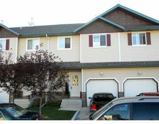 Photo 1:  in CALGARY: West Springs Townhouse for sale (Calgary)  : MLS®# C3235724